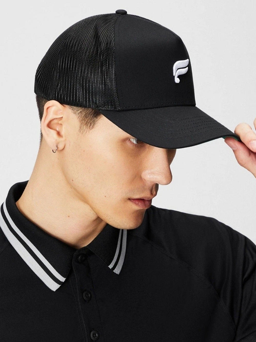 Fabletics Black Trucker Cap with White Wing Logo